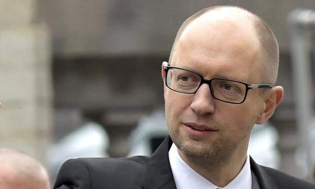 Yatsenyuk arrives at a EPP meeting in Brussels ahead of a European Union leaders summit