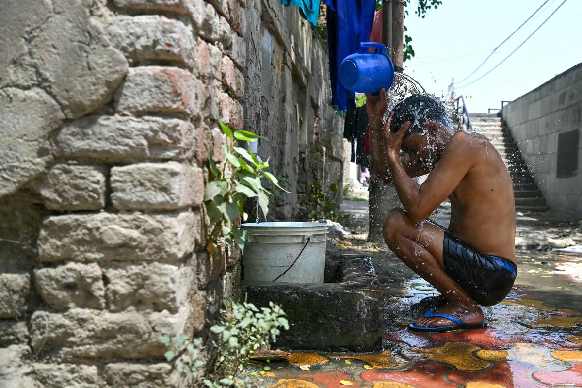 Trying to escape the Delhi heat.