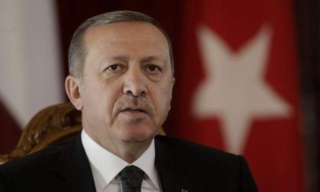 Turkey´s President Erdogan speaks during a news conference in Riga