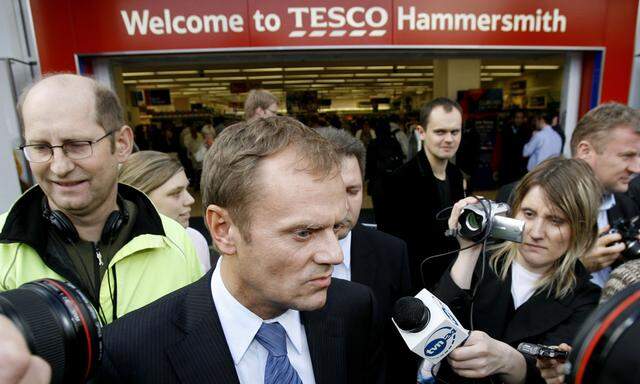 Leader of the Platforma Obywatelska party (Civic Platform) Tusk speaks to the media outside Tesco supermarket in Hammersmith