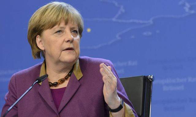 Germany's Chancellor Angela Merkel holds a news conference at the end of a European Union leaders summit in Brussels