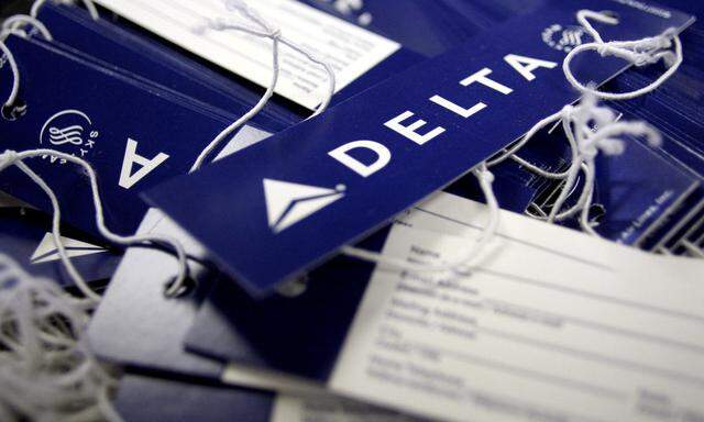Delta airline name tags are seen at Delta terminal in JFK Airport in New York