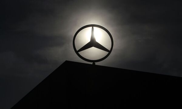 File photo of logo of Mercedes Benz is seen on top of a car factory in central Hungarian town of Kecskemet