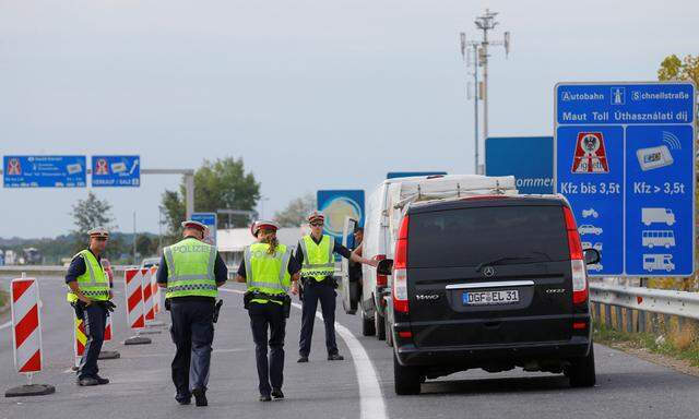 Police perform border control at the Austrian-Hungarian border in Nickelsdorf