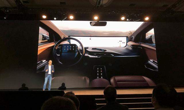 Benoit Jacob, head of design for Byton, speaks about the 48-inch screen inside the company's electric vehicle, set for production later in 2019, during the 2019 CES in Las Vegas