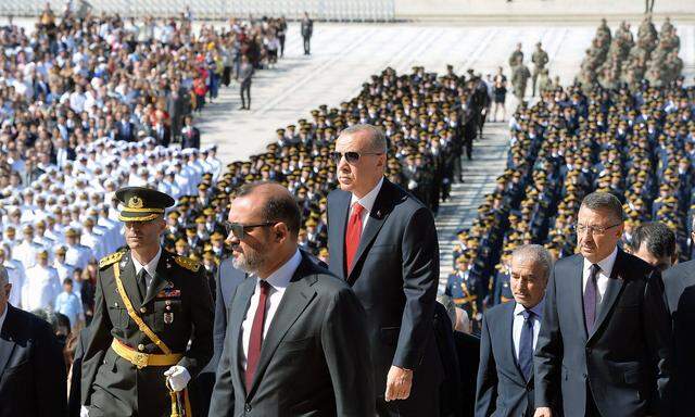 190830 ANKARA Aug 30 2019 Turkish President Recep Tayyip Erdogan attends a ceremony held