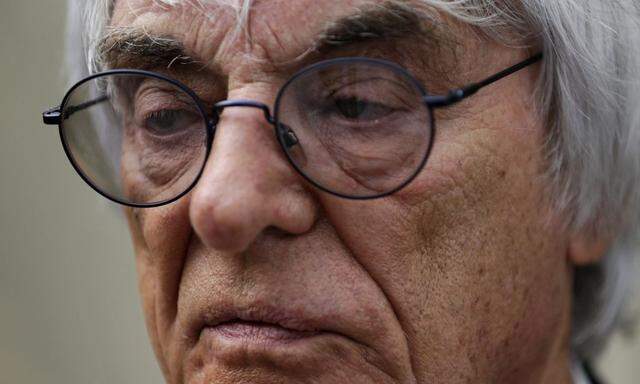 Formula One commercial supremo Bernie Ecclestone looks on as he attends an event at a hotel ahead of the Singapore F1 Grand Prix, in Singapore