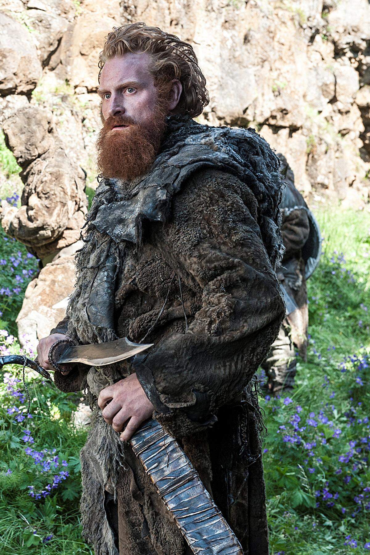 Der Wildling ist ein Vertrauter von Mance Rayder, dem König nördlich der Mauer. Mit ihm kletterten Jon Snow und Ygritte über die Wall.