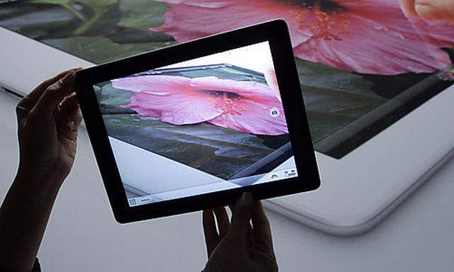 A new Apple iPad on display using the video during an Apple event in San Francisco, Wednesday, March 