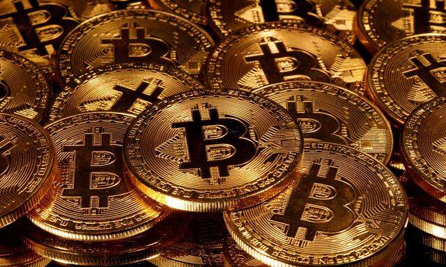 FILE PHOTO: FILE PHOTO: Representations of virtual currency Bitcoin are seen in this picture illustration taken