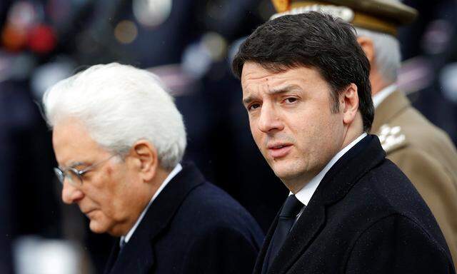 File photo of Italian PM Renzi and Italy´s newly elected president Mattarella arrive at the Unknown Soldier´s monument in central Rome