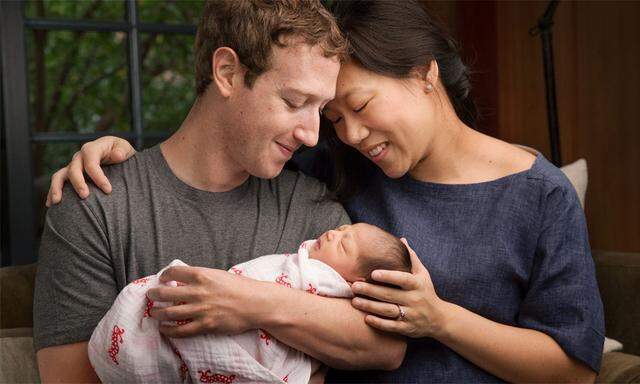 Mark Zuckerberg mit seiner Frau Priscilla Chan und Max.