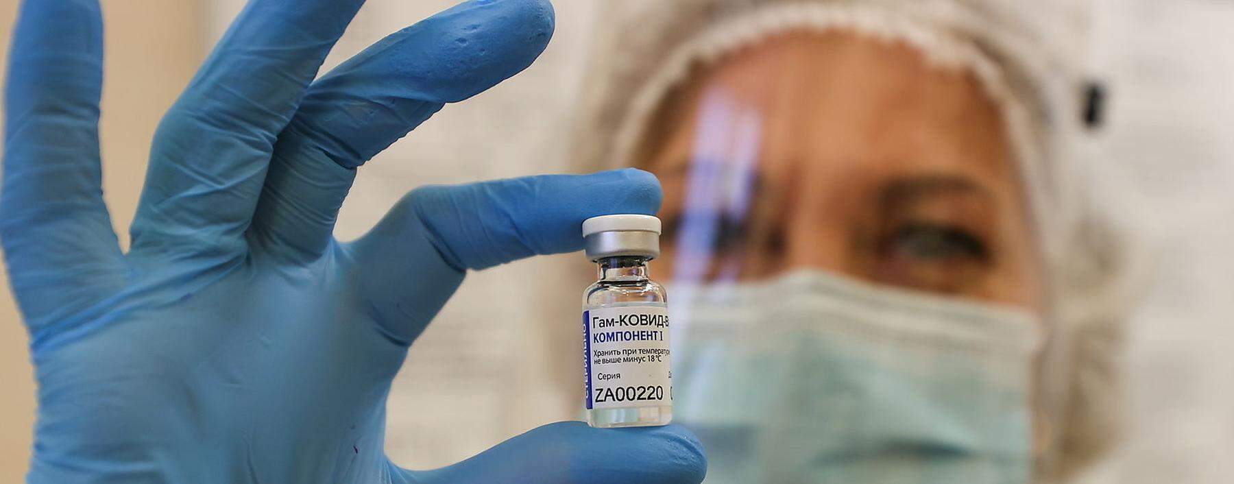 A medical worker demonstrates a vial with Sputnik V (Gam-COVID-Vac) vaccine during the vaccination against the coronavirus disease (COVID-19) at a clinic in Minsk