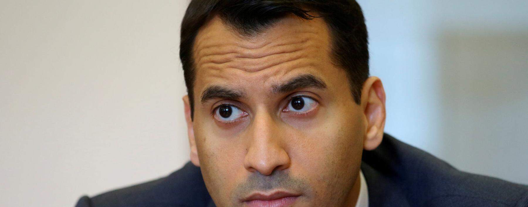 FILE PHOTO: Chief Financial Officer Abuzaakouk of Austrian bank BAWAG PSK listens during a Reuters interview in Vienna