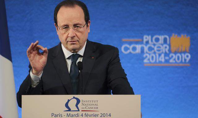 French President Hollande delivers his speech during the annual national cancer institute (INCa) meeting in Paris