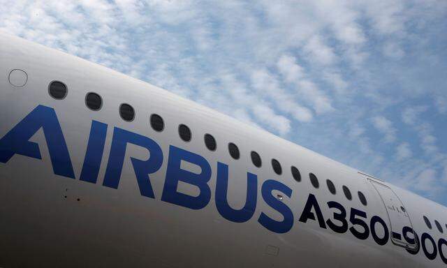 Airbus A350 aircraft sits on the tarmac on display at the Singapore Airshow