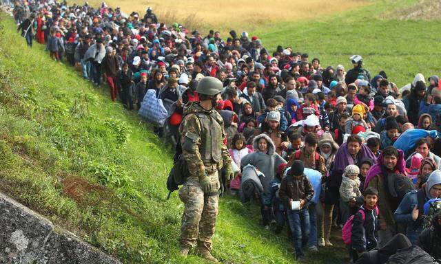 Refugees walking Rigonce Croatia 23 10 2015 Brezice Slovenia About 1500 refugees walk from t