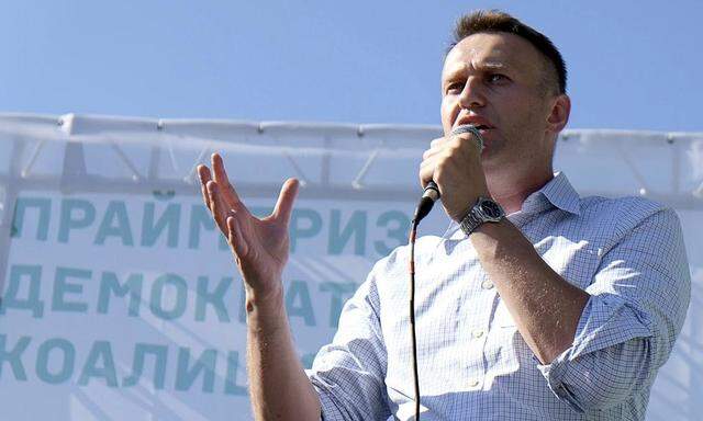 Russian opposition leader Navalny speaks during a meeting with locals for the upcoming Democratic coalition primary election in Novosibirsk