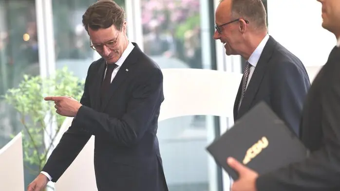 CDU-Parteifreunde und Rivalen: Hendrik Wüst und Friedrich Merz. 