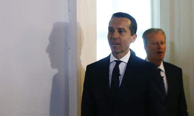 Austrian Chancellor Kern and Vice Chancellor Mitterlehner arrive to address a news conference in Vienna