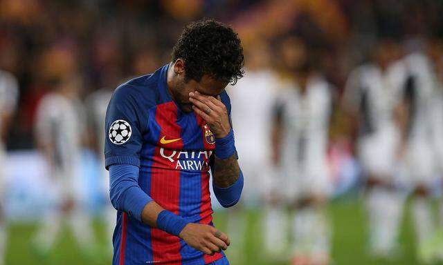 Barcelona's Neymar looks dejected after the match