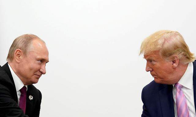 Archivbild: Putin und Trump bei einem Treffen im vergangenen Juni.