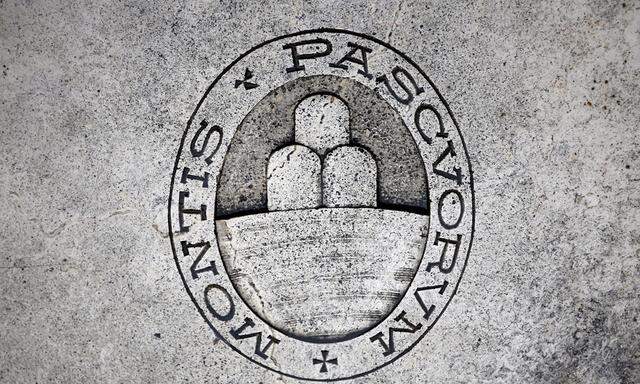 A logo of Monte dei Paschi di Siena bank is seen on the ground in Siena
