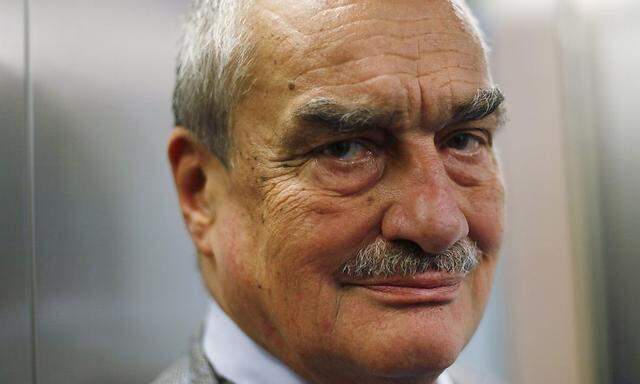 Chairman of the TOP09 political party Schwarzenberg stands in a lift as he arrives to take a part in Reuters Summit in Prague