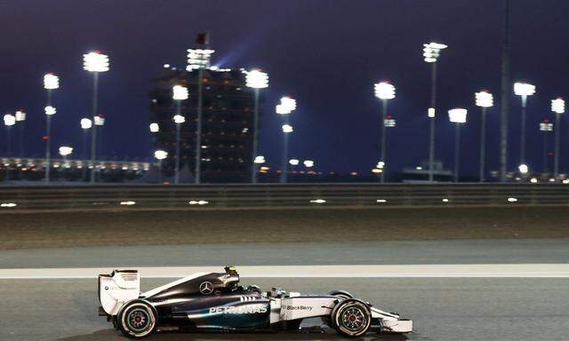 Mercedes Formula One driver Nico Rosberg of Germany drives during the qualifying session of the Bahrain F1 Grand Prix at the Bahrain International Circuit (BIC) in Sakhir