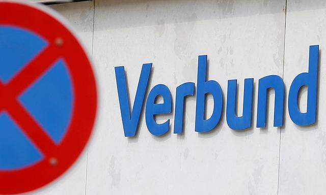 The logo of Austrian hydropower producer Verbund is seen behind a traffic sign at its headquarters in Vienna
