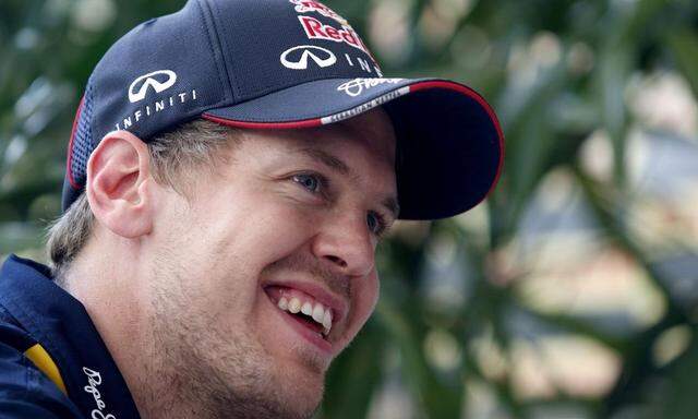 Red Bull Formula One driver Vettel speaks to journalists ahead of the Malaysian F1 Grand Prix at Sepang International Circuit outside Kuala Lumpur
