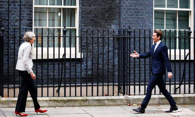 Britain's Prime Minister Theresa May greets Austrian Chancellor Sebastian Kurz in Downing Street in London