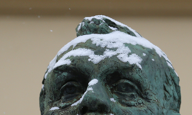 Snow flakes fall on a statue of the founder of the Nobel Prize, Alfred Nobel, outside the Norwegian Nobel Institute in Oslo