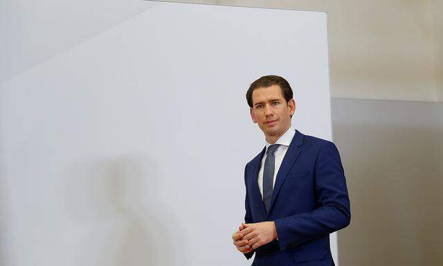 Head of OeVP Kurz arrives for a meeting in Vienna