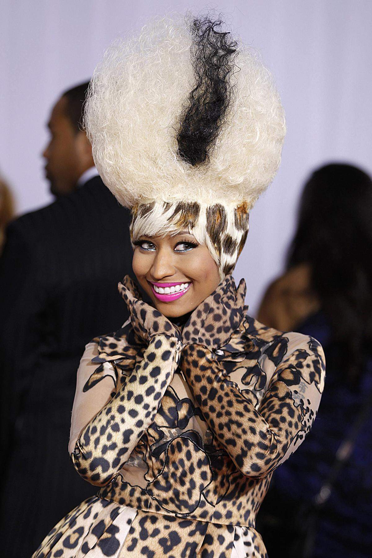 Die 28-Jährige besticht nicht nur durch Musikproduktionen, die nicht näher am Zeitgeist sein könnten, sondern auch durch schrille Outfits.Im Bild: Nicki Minaj im Tiger-Look bei den 53. Grammy Awards am 13. Februar in Los Angeles.