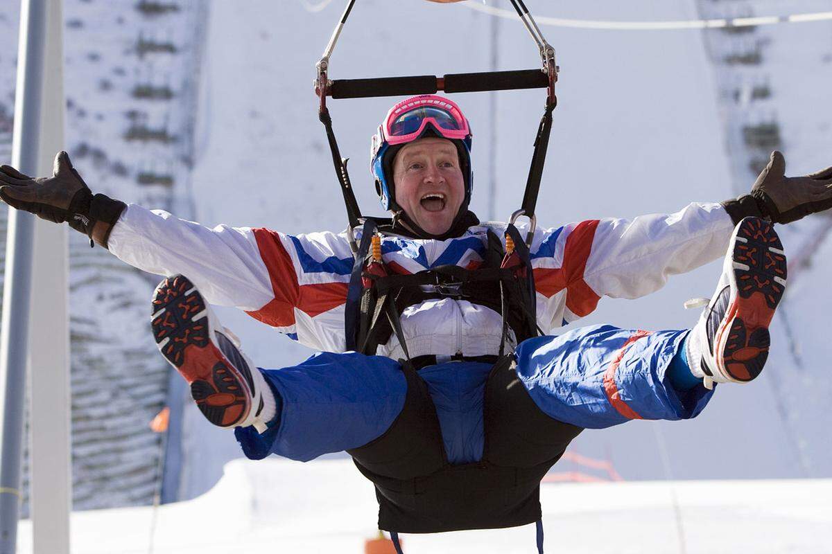 Der Name Michael Edwards ist nur Fans geläufig, doch "Eddie the Eagle" ist weltweit bekannt. Der britische Skispringer war bekannt für seine vielen letzten Plätze, stellte aber auch 1988 einen britischen Skisprung-Rekord auf - mit spektakulären 73,5 Metern.