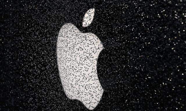 FILE PHOTO: Apple's logo is seen outside flagship store downtown Milan