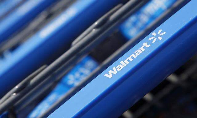 Shopping carts are seen outside a new Wal-Mart Express store in Chicago