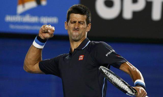 Novak Djokovic of Serbia celebrates after defeating Fernando Verdasco of Spain in their men's singles third round match at the Australian Open 2015 tennis tournament in Melbourne