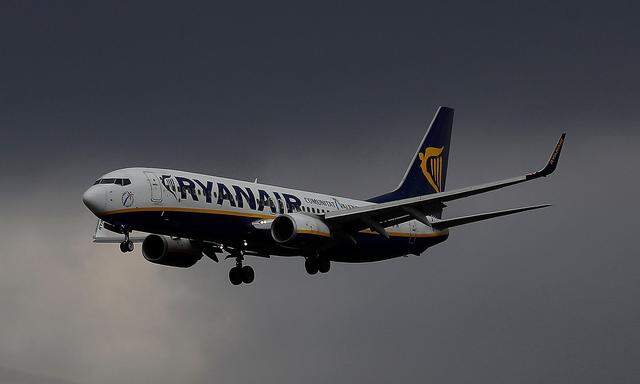 FILE PHOTO: A Ryanair plane prepares to land at Manchester Airport in Manchester Britain.