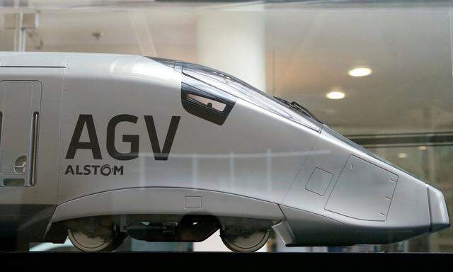 FILE PHOTO: A scale model of an AGV high speed train with the logo of Alstom is seen in Saint-Ouen, near Paris.