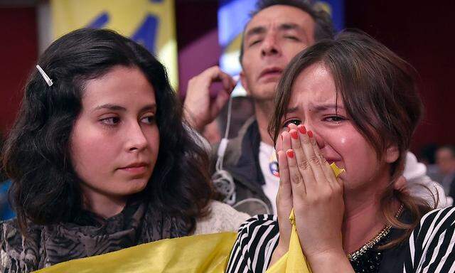 Entsetzte Kolumbianer bei der Bekanntgabe des Ergebnisses