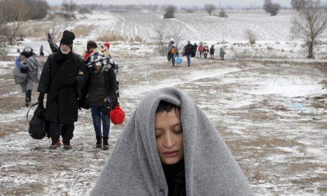 A Picture And Its Story: Migrants struggle through Balkans winter