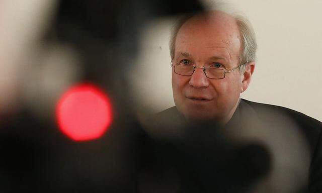 Austrian Cardinal Schoenborn addresses a news conference in Vienna