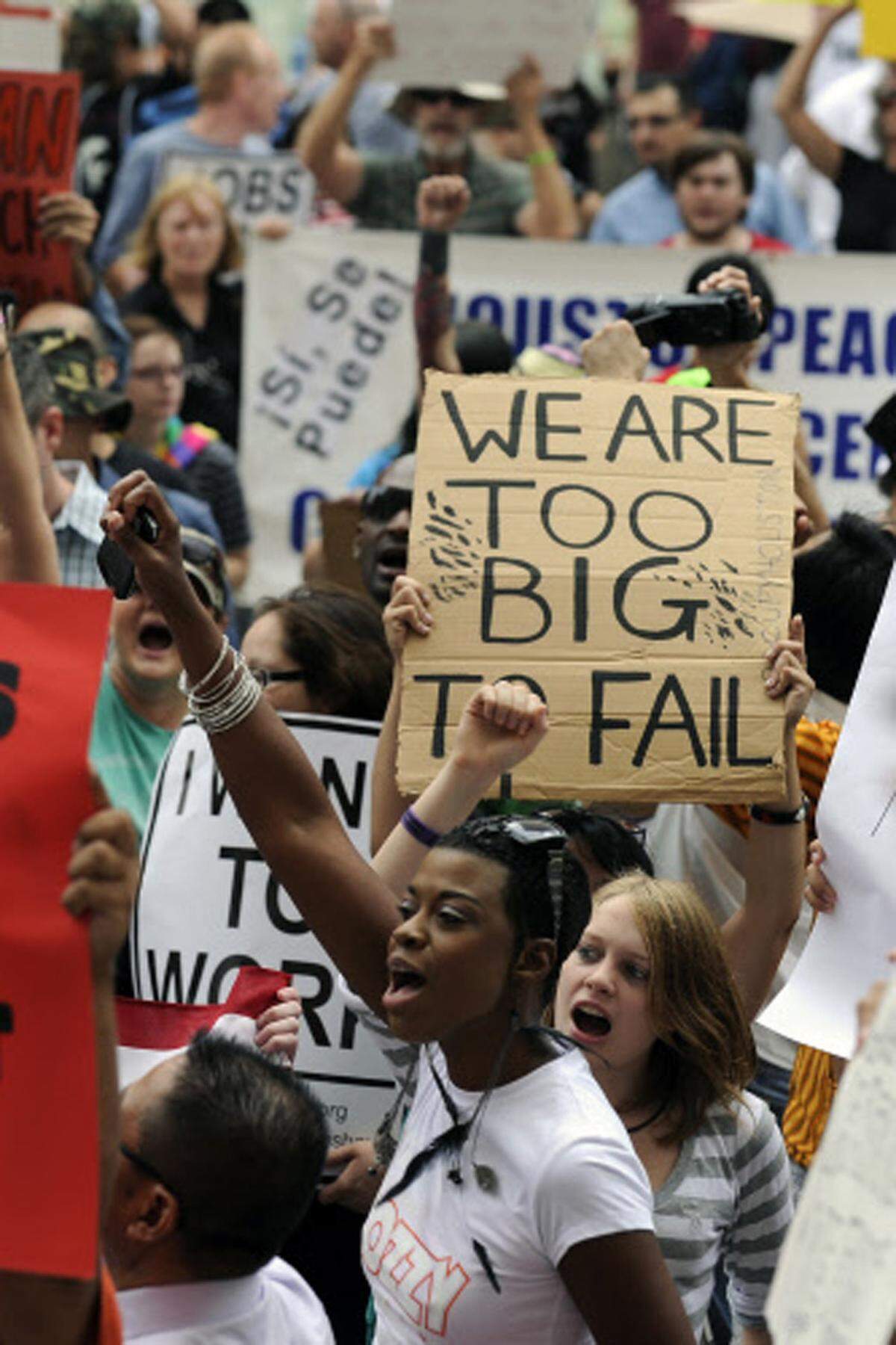 ... und Houston über. "We are too big to fail": Die Demonstranten wollen wie die Banken gerettet werden ...