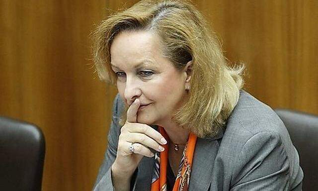 Austrian Finance Minister Fekter listens after her budget speech in the Parliament in Vienna