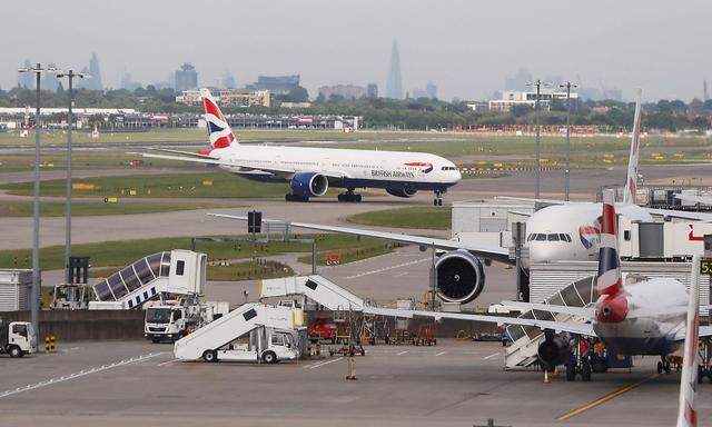 British Airways planes are seen at Heathrow Terminal 5 in London