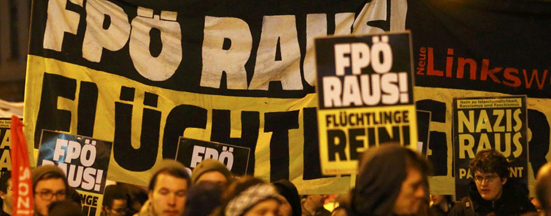 Protesters march as they demonstrate against Austrian Freedom Party´s (FPOe) Akademikerball ball in Vienna