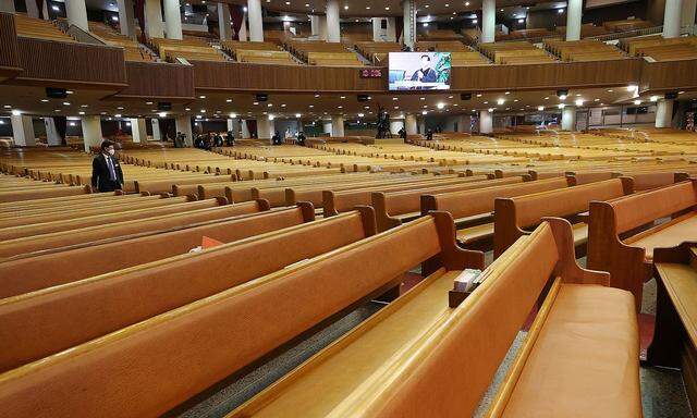 An empty grand hall of a church is pictured during a service in Seoul