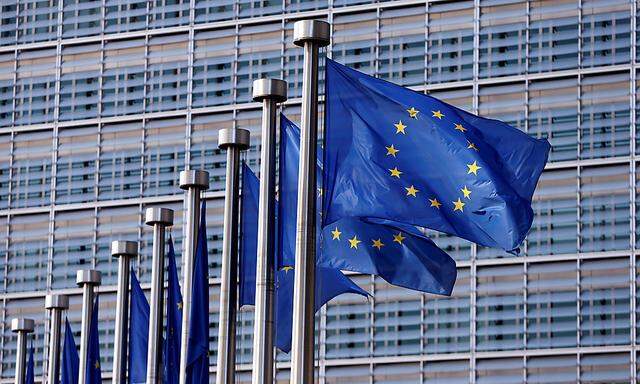 EU flags flutter outside the EU Commission headquarters in Brussels